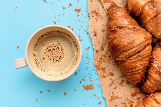 istock Coffee and croissant for breakfast, top view 1178197367