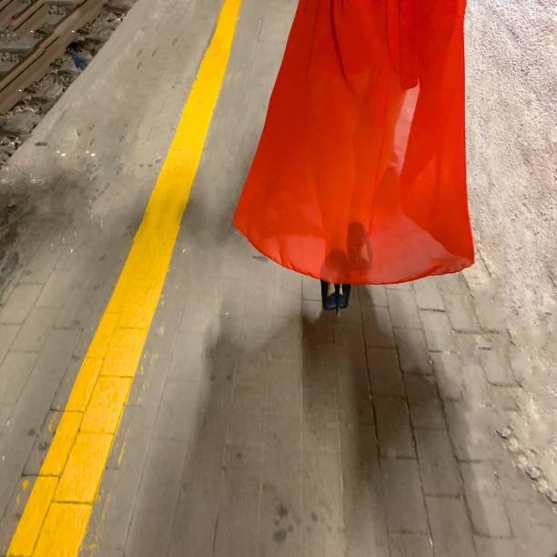 frau in rot - leaving loneliness women railroad track stock-fotos und bilder