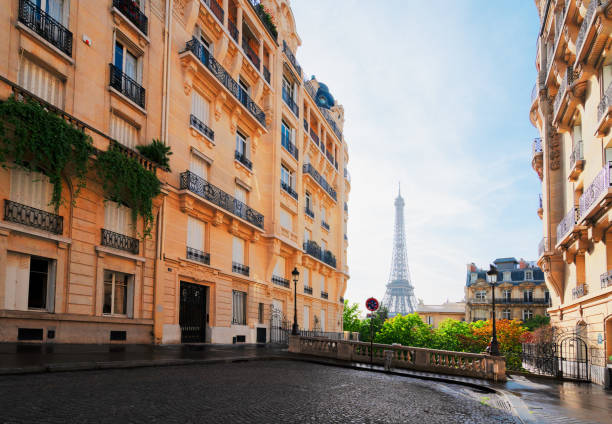 istock eiffel tour and Paris street 1178200855