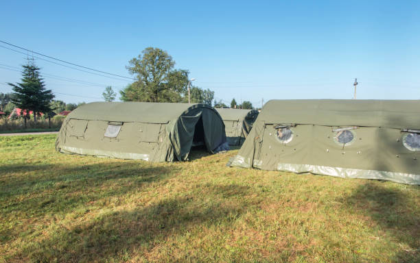 istock large, green, military canvas tents 1178202161