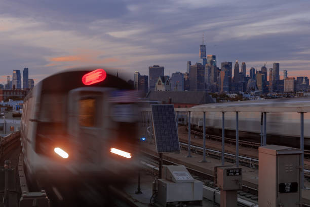 istock Subway Trains and NYC Skyline 1178204374