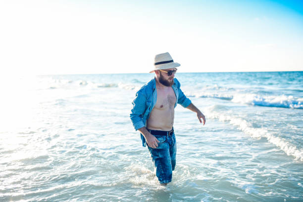 istock Male Knee Deep In Sea Water 1178207057