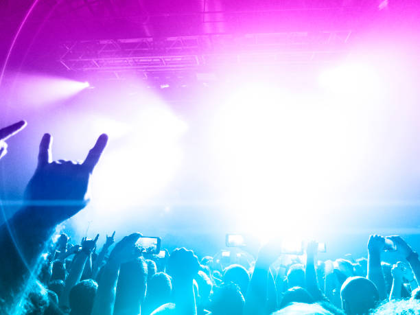 istock Filming concert on smart phone 1178223012