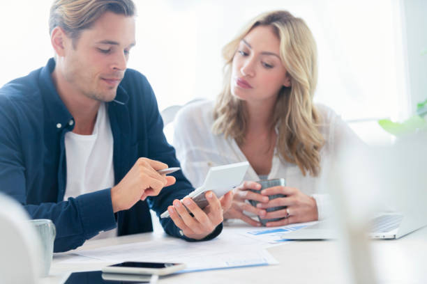 istock Young Couple working on their home finances. 1178223092