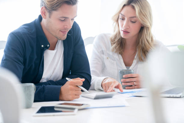 istock Young Couple working on their home finances. 1178223102