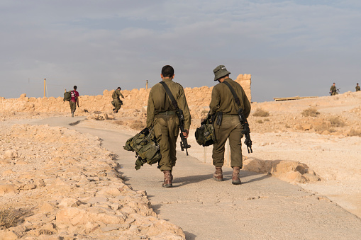 Soldiers are patrolling for security Israeli army military exercises in early morning in the ruins of the fortress Massada. Israel. 23 October 2018