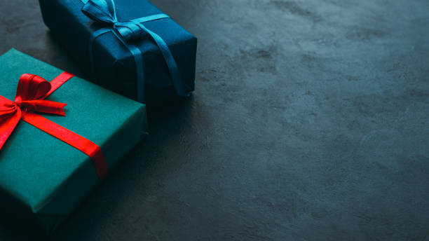 special occasion gift boxes teal blue background