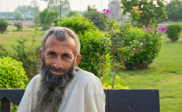 Lahore Fort, Lahore/Pakistan-August 15, 2019:Pakistani man is  posing  at the garden of  Lahore Fort.