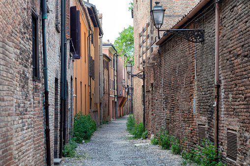Narrow street in Ferrara, Italy