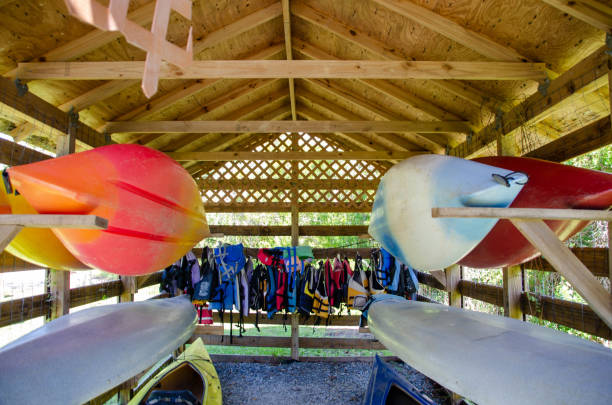 Kayak And Canoe Storage With Life Jackets In The Background Stock Photo -  Download Image Now - iStock