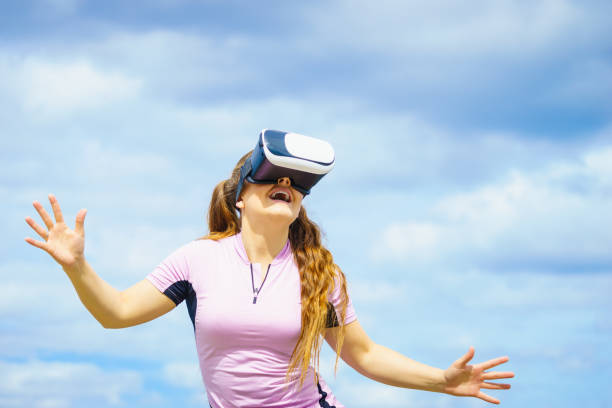 istock Woman wearing VR outside 1178241304