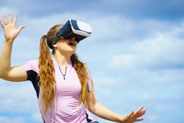 istock Woman wearing VR outside 1178241313