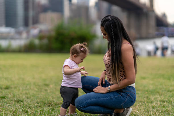 istock Mother and daughter in park 1178243635