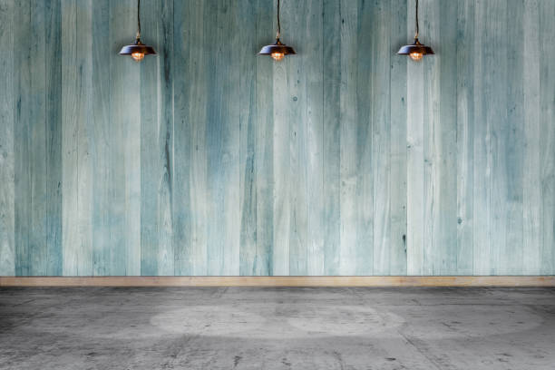 istock Empty room - wooden wall with lamp and laminate flooring. User for background 1178244691