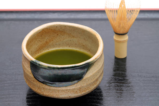 istock Japanese matcha green tea in a bowl with tea whisk 1178245100
