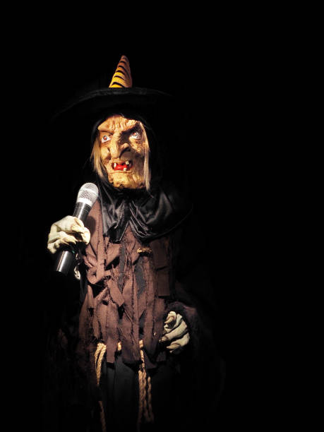 istock Scary witch in the night. Halloween concept. Isolated on black 1178246684