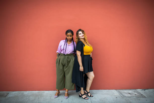 istock Two beautiful girls looking at the camera. 1178247253