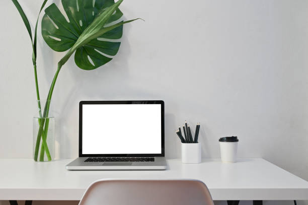 istock Mockup laptop computer, coffee, pencil and plant decoration with workspace computer. 1178248887