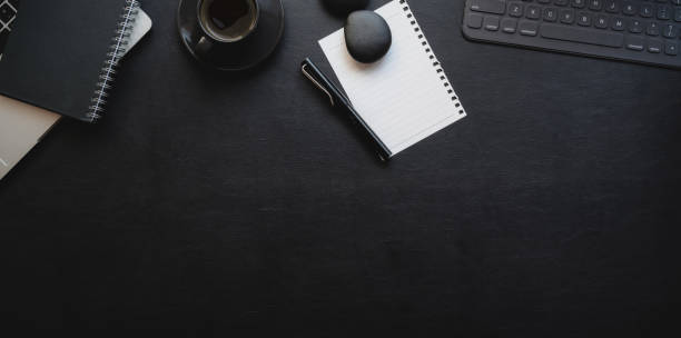 istock Dark luxury workplace with copy space and office supplies 1178252793