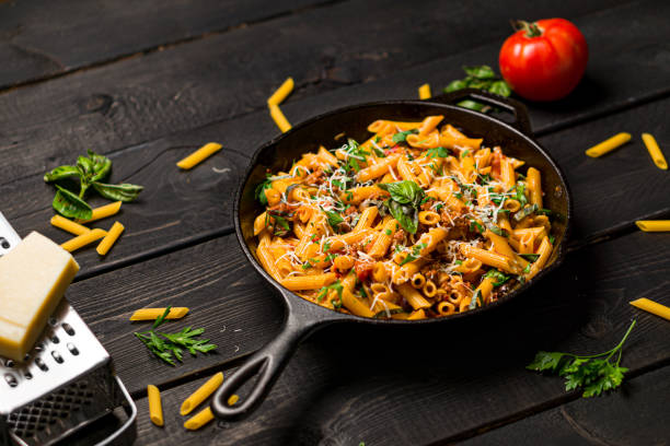 istock Penne pasta in skillet. 1178254028