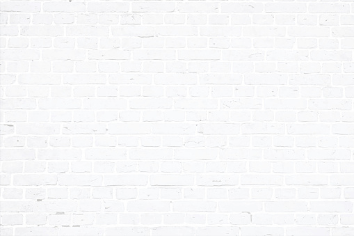 A white, light gray colored brick wall with rectangular blocks, textured grungy backgrounds. No text. No people, copy space, copyspace