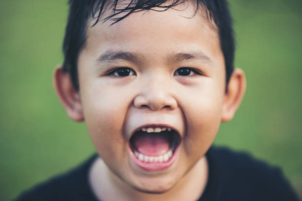 istock Portrait of happy Boy Smiling 1178257267