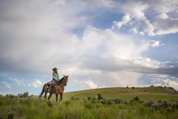 istock Cowgirl Horseback Riding 1178259086