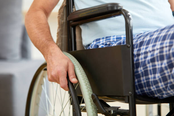 istock Senior man riding on wheelchair 1178263119