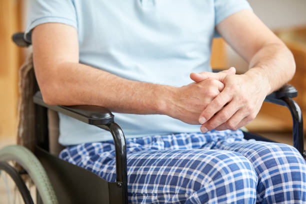 istock Man in wheelchair 1178263996