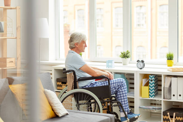 istock Senior patient sitting in wheelchair 1178264130