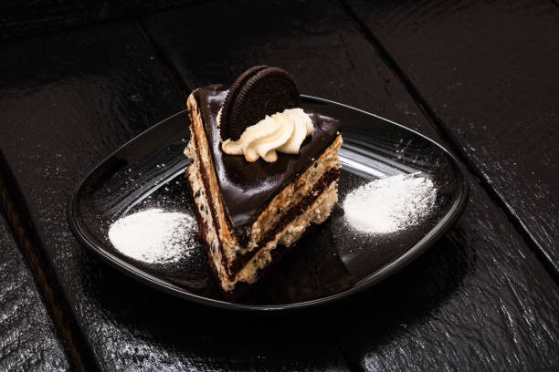 istock Creamy cheesecake with chocolate cookies and cream biscuits. 1178268323