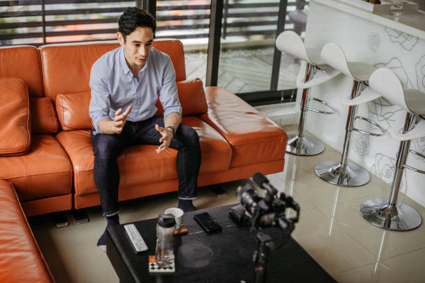istock Vlogger recording content for his vlog 1178270535
