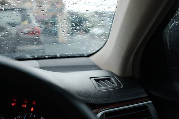 istock Close up on car panel with raindrops background on raining season 1178271606