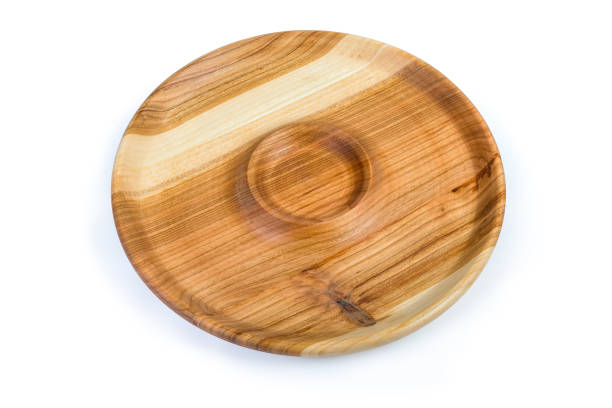 istock Empty round wooden serving dish with sauce boat in center 1178274285