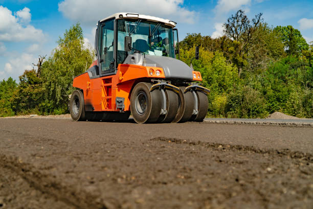 istock Road roller working on the new road construction site. 1178275222