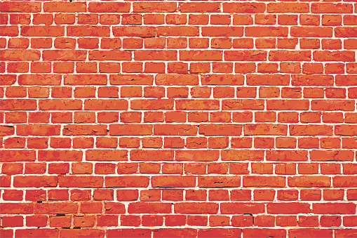 A vibrant orange and red  colored brick wall with rectangular blocks, textured grungy backgrounds. No text. No people, copy space, copyspace. The cemented, cement masonry joints are white coloured. The bricks are uneven grunge texture, imperfect.