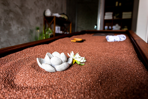 A warming backrest relaxation quartz bed in a health spa.