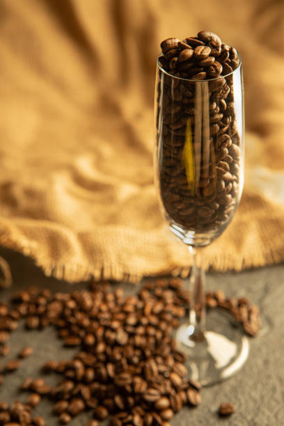 istock caffe beans in a champagne glass 1178281484