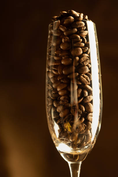 istock caffe beans in a champagne glass 1178281491
