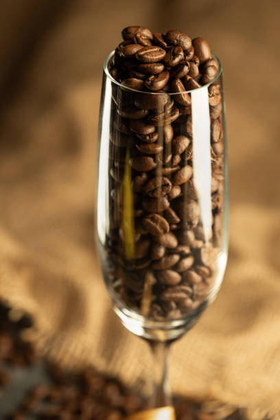 istock caffe beans in a champagne glass 1178281514