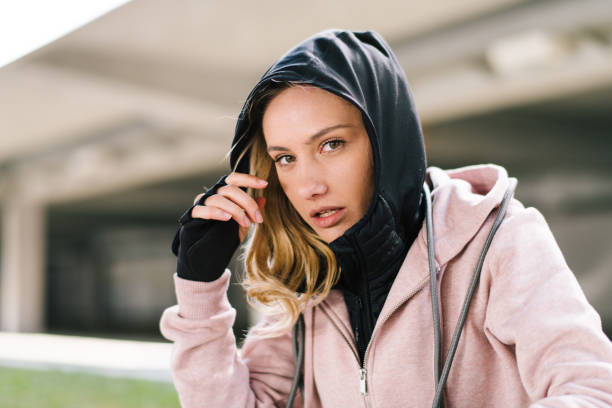 istock Young woman taking a break from jogging 1178283137