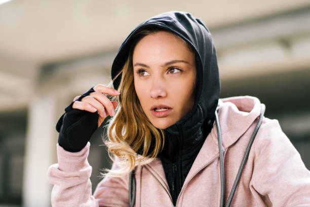istock Young woman taking a break from jogging 1178283662