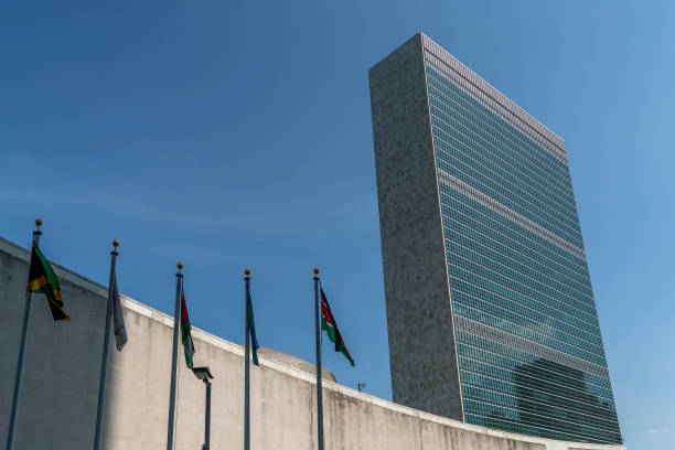 istock flags outside united nations building in new york 1178283843