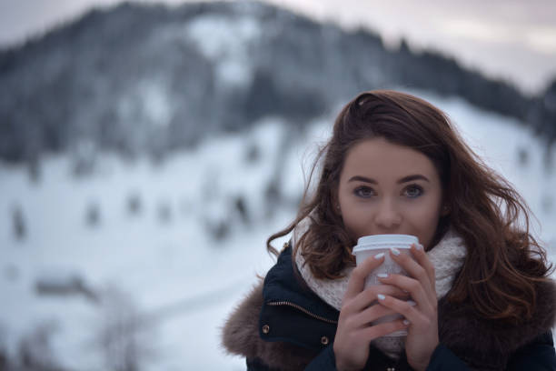 istock Teenage girl drinking coffee 1178291157