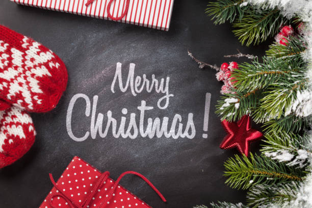 istock Christmas gift box and fir tree branch 1178291720