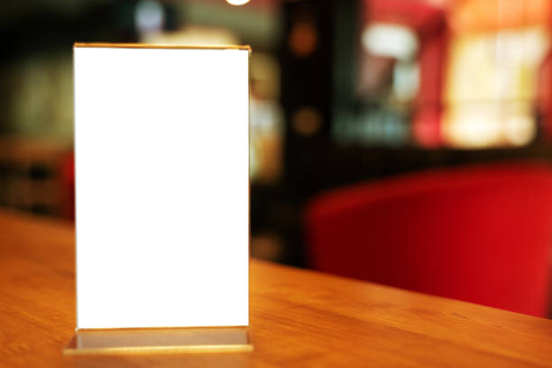 istock Mock up Menu frame standing on wood table in Bar restaurant cafe. space for text 1178291797