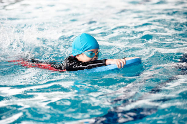 istock One girl wearing practice swimming. 1178292572