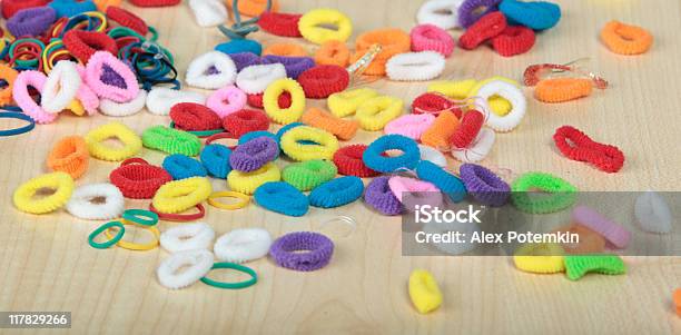 Girls Hands Witn Elastic Bands And Hairdressing Decoration Stock Photo - Download Image Now
