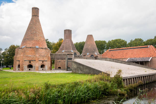 Complete restored lime kiln in the village Dedemsvaart Complete restored lime kiln in the village Dedemsvaart the Netherlands, it was in use in the 19 century for making quicklime out of shells, with peat as burning fuel lime kiln lighthouse stock pictures, royalty-free photos & images