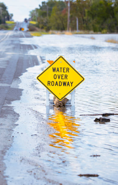 Sign saying water over roadway is very accurate.